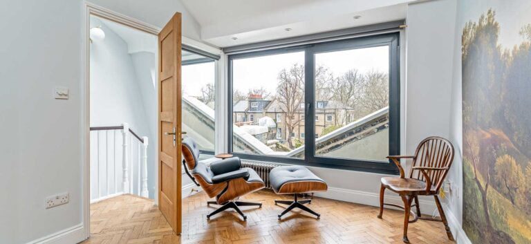 loft room with large feature window
