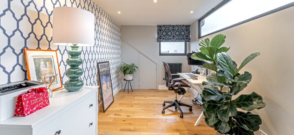 home office in loft conversion with letterbox window