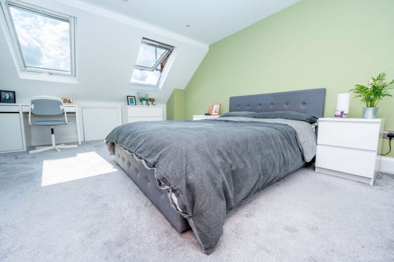 green bedroom in loft conversion