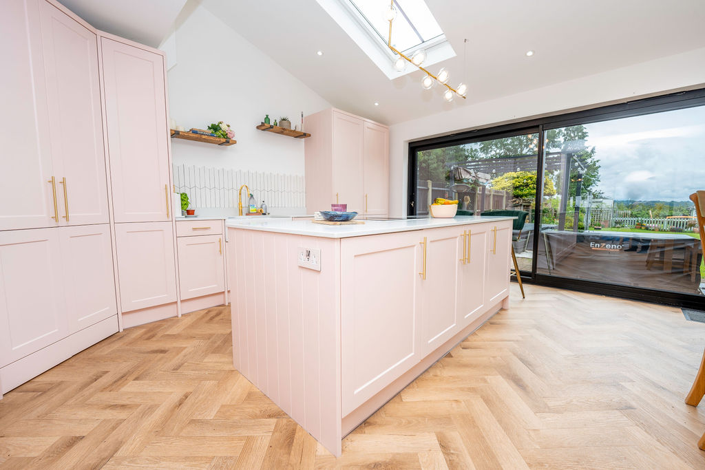 Fresh, new pink kitchen in ground floor home extension